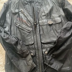 Harley Davidson leather jacket. Sleeves are a heavy windbreaker material.